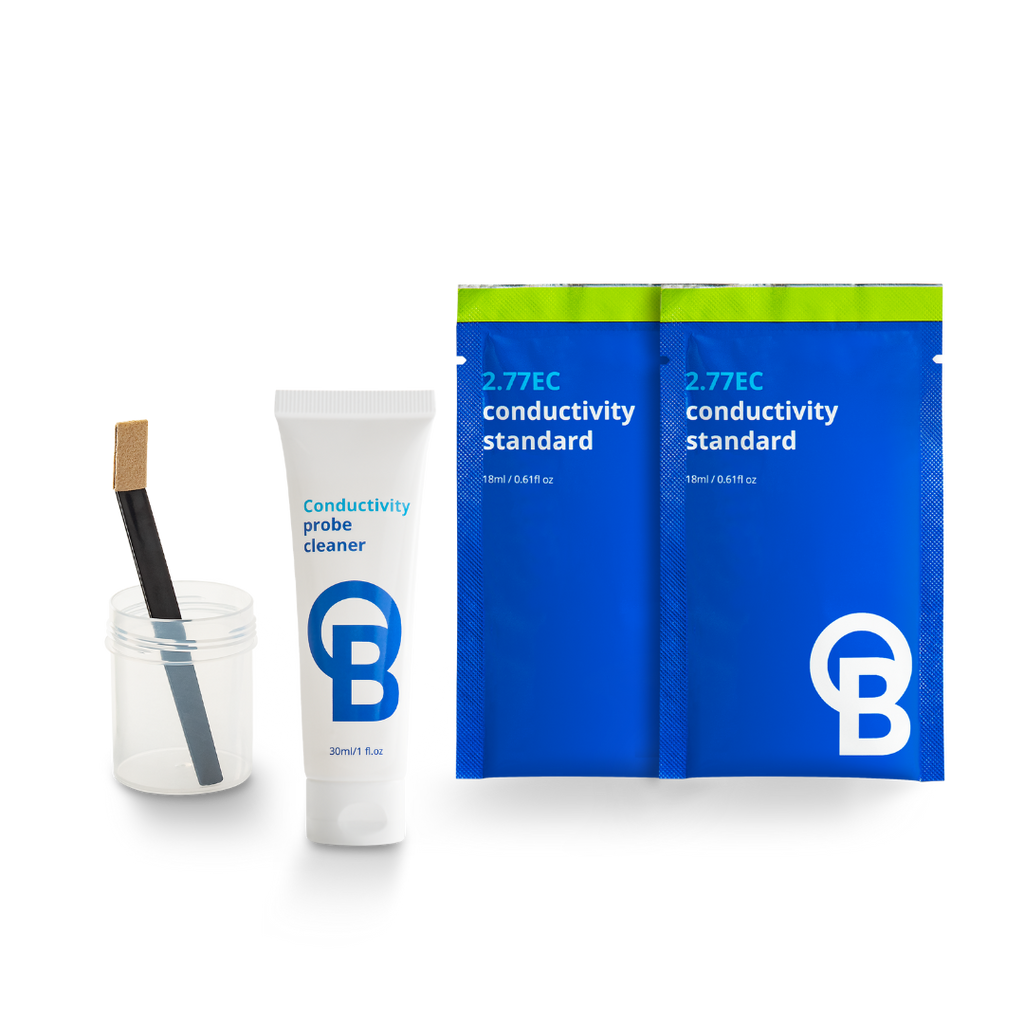 A Bluelab conductivity probe cleaner kit on a white background, featuring a white tube of probe cleaner, a small clear jar with a black-handled brush, and two blue pouches labeled 2.77EC conductivity standard with a bright green top strip.